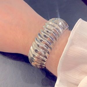 Silver Toned Bangle.
